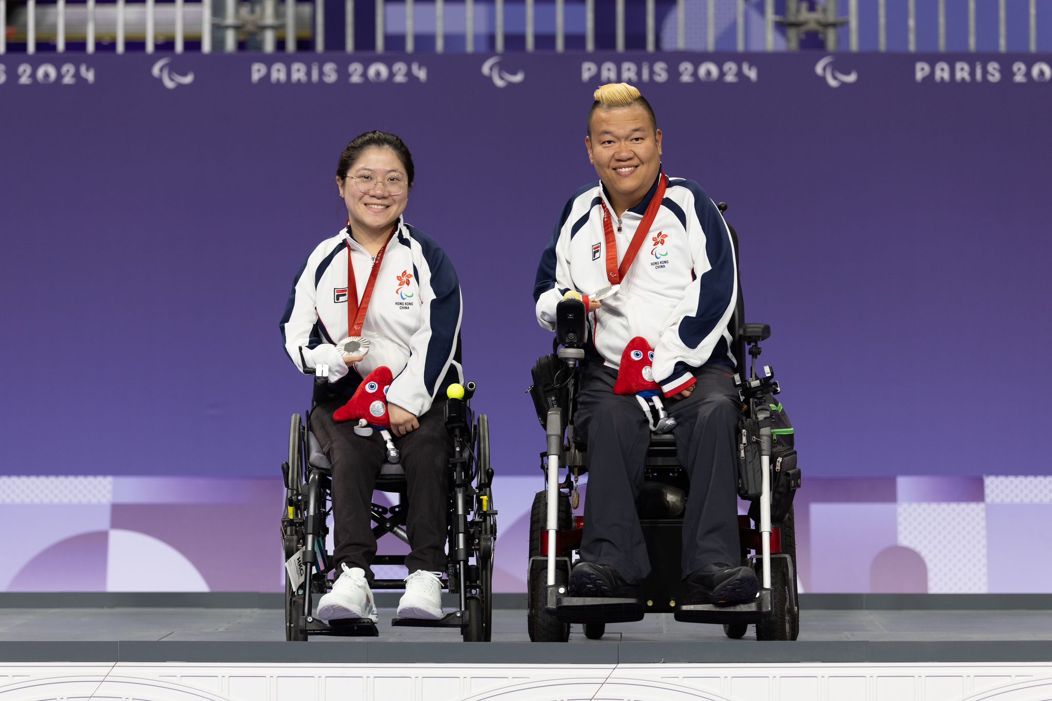 Boccia players Leung Yuk-wing and Cheung Yuen win the silver medal in the boccia mix pairs BC4. (2024) Photo: China Hong Kong Paralympic Committee